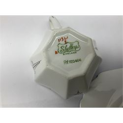 1920s Shelley Queen Anne shaped trio, decorated in the Blue Iris pattern no. 11561, ith printed mark beneath 