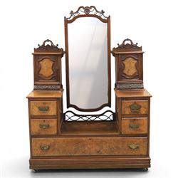 Edwardian figured walnut dressing chest, with central tilting mirror with pierced fret wor...