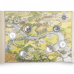 Two part coin sets 2021 'The Wind in the Willows' produced for the Bradford Exchange, one comprising six 'Fine .999 Silver' Ascension Island fifty pence coins, the second comprising six 'Layered in Pure Silver' Ascension Island fifty pence coins, both with certificates
