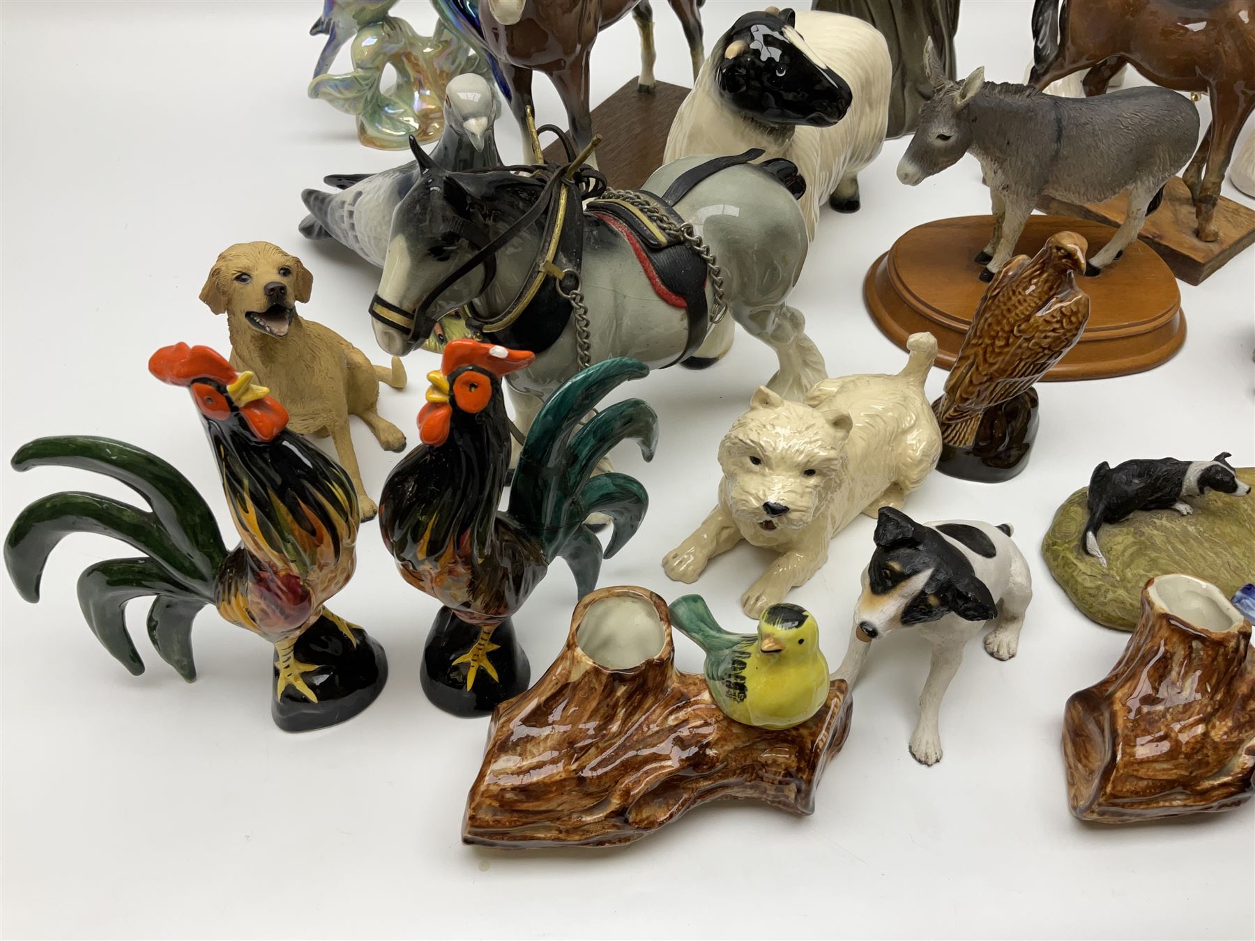 Beswick pigeon no 1383 and a collection of other ceramic animal figures including Campsie Ware lustre budgies, Kowa red fox and Labrador, two shire ponies, two sheep, etc 