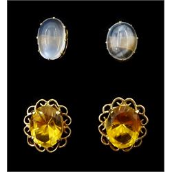 Pair of gold cabochon moonstone stud earrings and a pair of gold citrine stud earrings, both 9ct