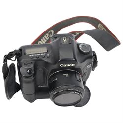 Canon EOS 5D camera body serial no. 0430100905, with shoulder strap, battery grip BG-E4 and Canon 50mm 1.1.8 EF lens serial no.31235679