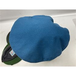 Four paratrooper berets - Russian, Italian, British and Foreign Legion; all with badges (4)