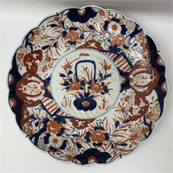 Three Japanese Imari chargers with scalloped edges, largest D38cm