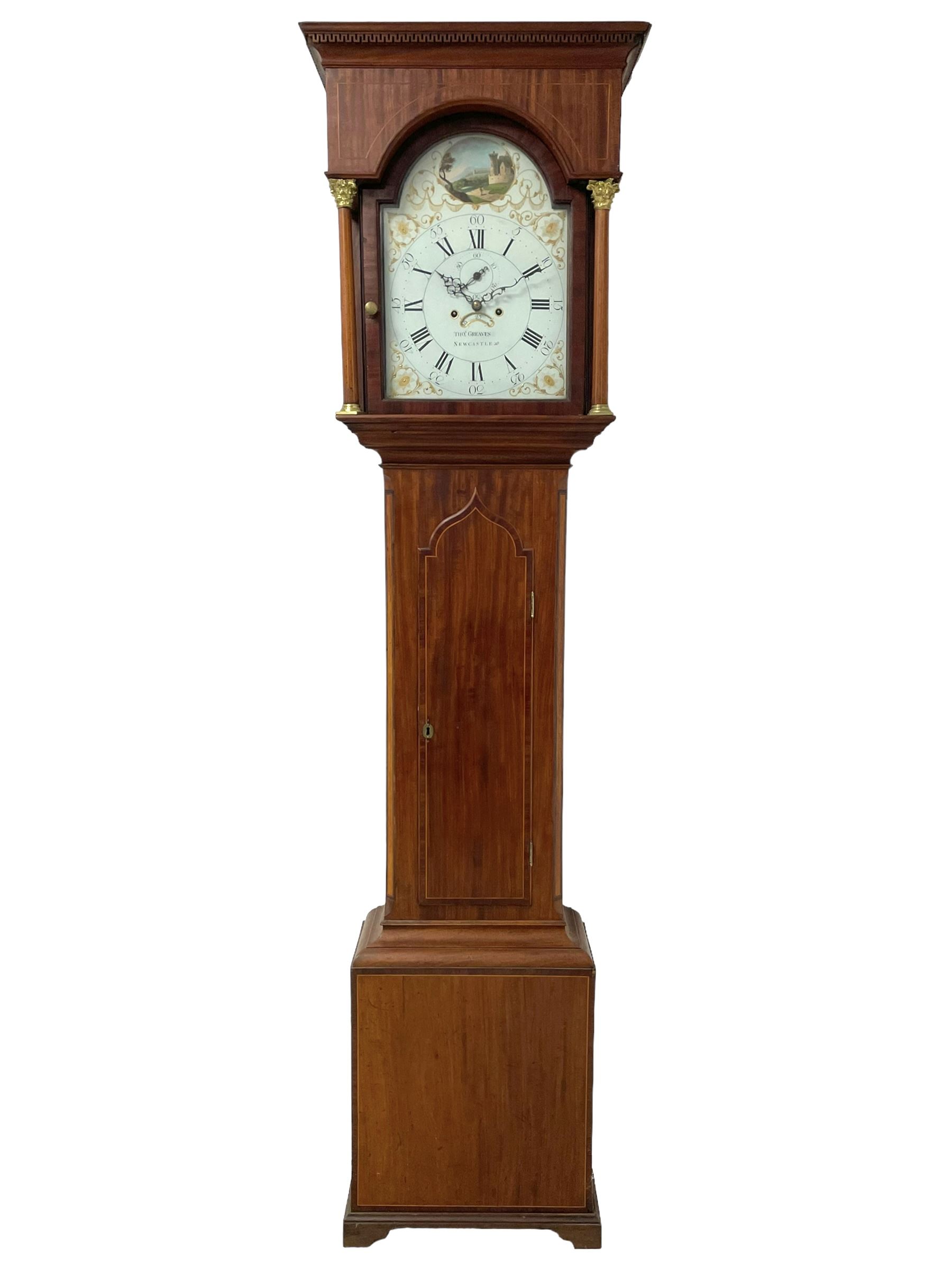 Thomas Greaves of Newcastle - late 18th century 8-day mahogany longcase clock c1790, with a flat topped hood and break arch hood door flanked by pilasters with Corinthian capitals, trunk with canted corners and ogee spire topped trunk door, rectangular plinth on a decorative stepped base,  early painted dial with raised gesso spandrels and a painted oval landscape to the arch, with matching steel hands, Roman numerals, five minute Arabic's and minute markers, subsidiary seconds dial and calendar aperture,  dial pinned via a cast falseplate to a rack striking movement with a recoil anchor escapement, striking the hours on a bell. With pendulum and weights.
