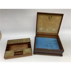 A Victorian mahogany box, of sarcophagus form upon four compressed bun feet, the hinged cover opening to reveal a compartmented interior, H15cm L38cm D33cm.