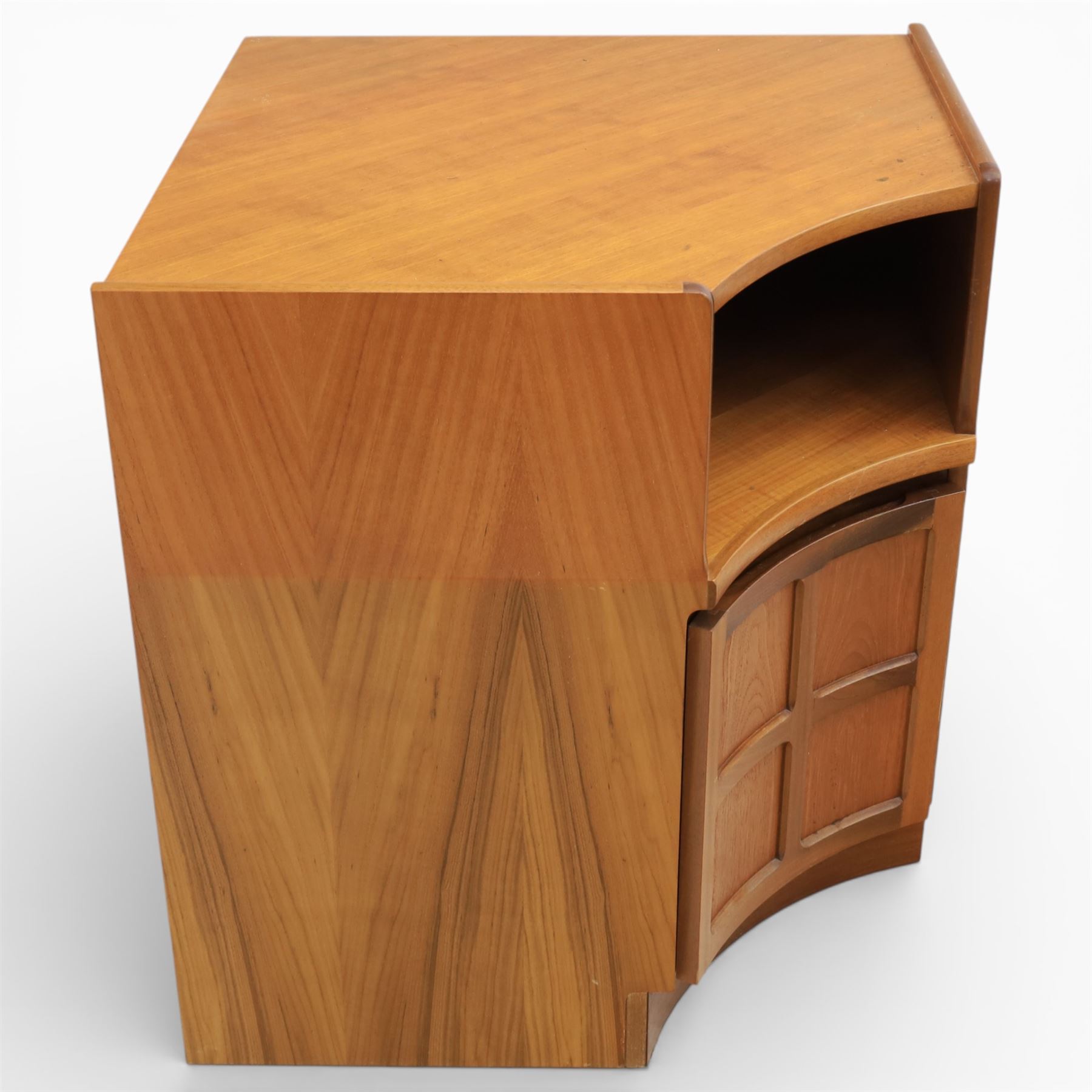 Nathan - concave corner cabinet, each of quarter round form with square top to fit against a wall, with open display compartment above a signature square panelled cupboard door, raised on a recessed plinth base