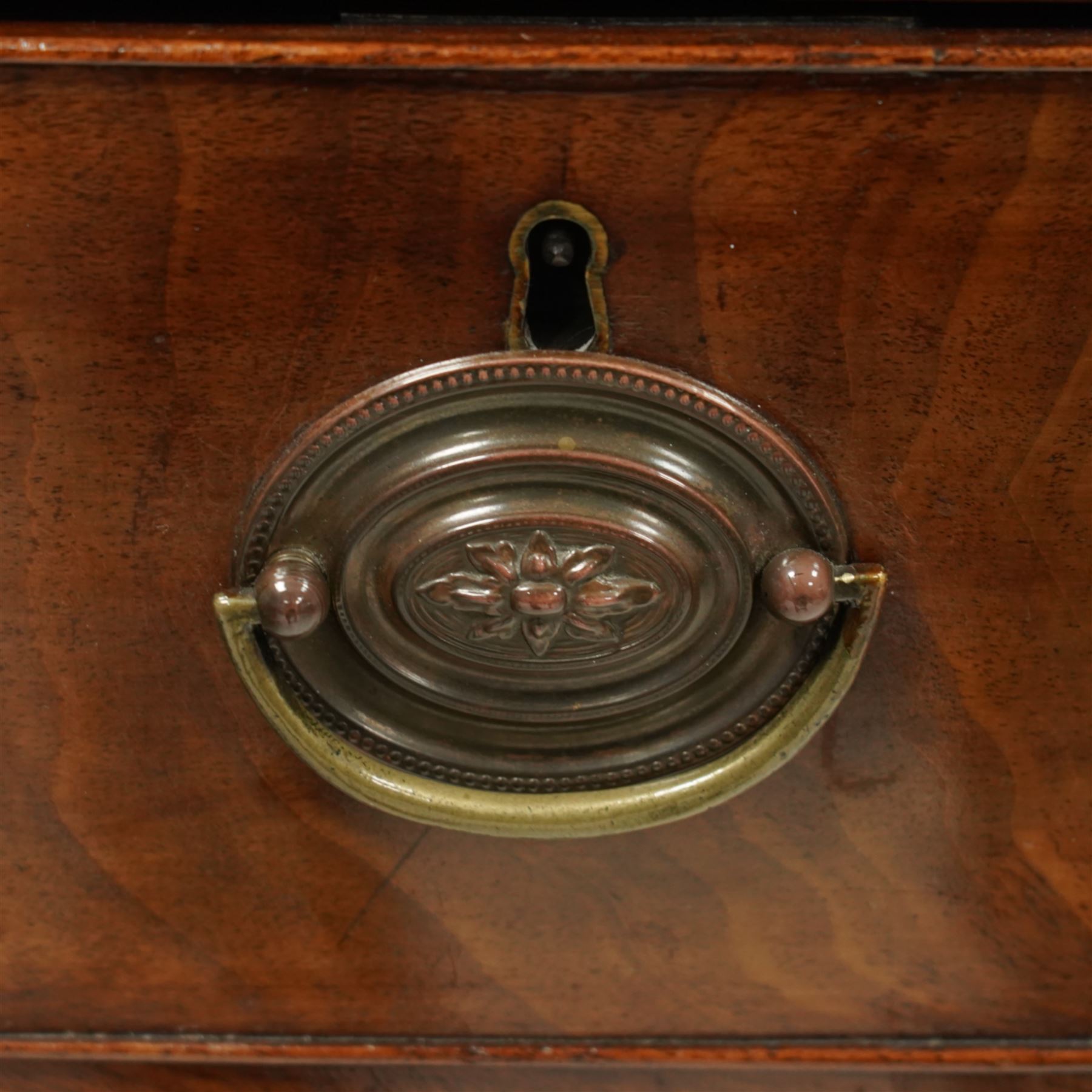 19th century mahogany bow-front chest, fitted with two short and three long graduating cock-beaded drawers, on bracket feet 