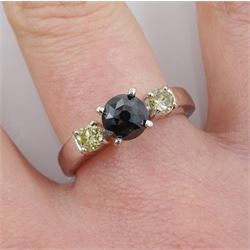 White gold three stone round black and yellow diamond ring, stamped 14K, black diamond 0.77 carat, total yellow diamond weight 0.30 carat