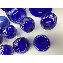 Bristol blue glass jug, together with blue claret jug, saucer, blue cut water jug, and seven matching glasses, water jug H22cm