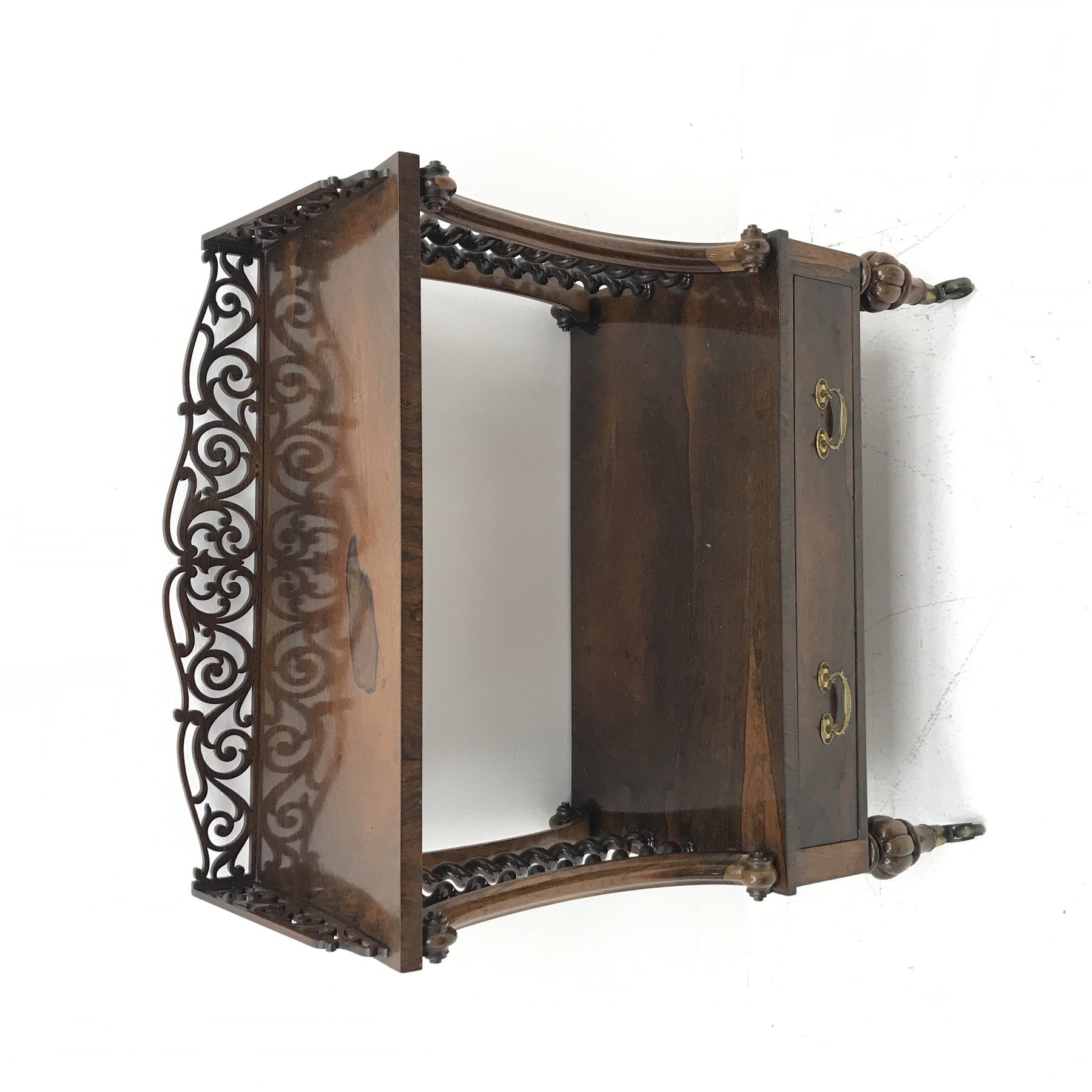 Victorian rosewood two tier etagere, scroll fretwork gallery back, carved elongated c scroll supports with scrolled terminals and barley twist supports, single drawer to base, turned and lobe carved feet with brass cups and castors, W77cm, H94cm, D36cm