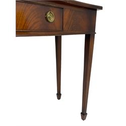 Georgian design mahogany serpentine fronted side table, reeded edge over frieze drawer, raised on tapering supports with spade feet