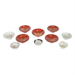 Five red lacquered saki bowls, together with five porcelain examples, red lacquered D9cm