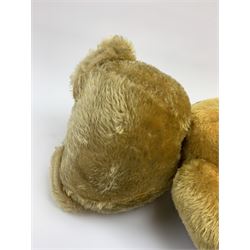 Very large Irish Tara bear c1950s with plush covered body, swivel jointed head with glass eyes and vertically stitched nose and mouth, jointed limbs with rexine pads and growler mechanism H37