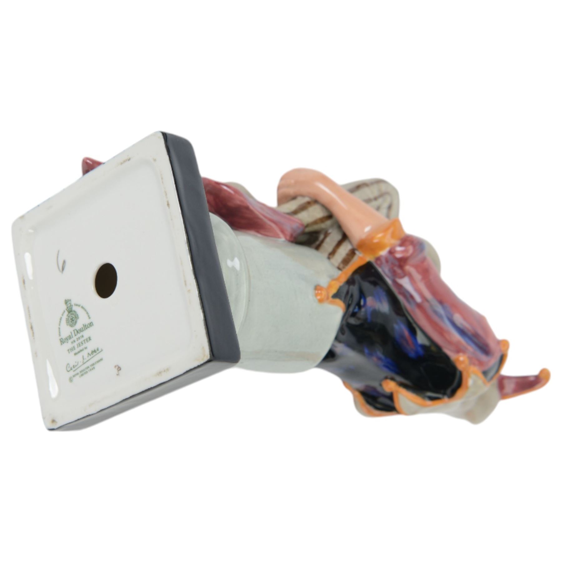 Four Royal Doulton figures, comprising The Judge HN2443, The Lawyer HN3041, Punch and Judy Man HN2765 and HN2016 