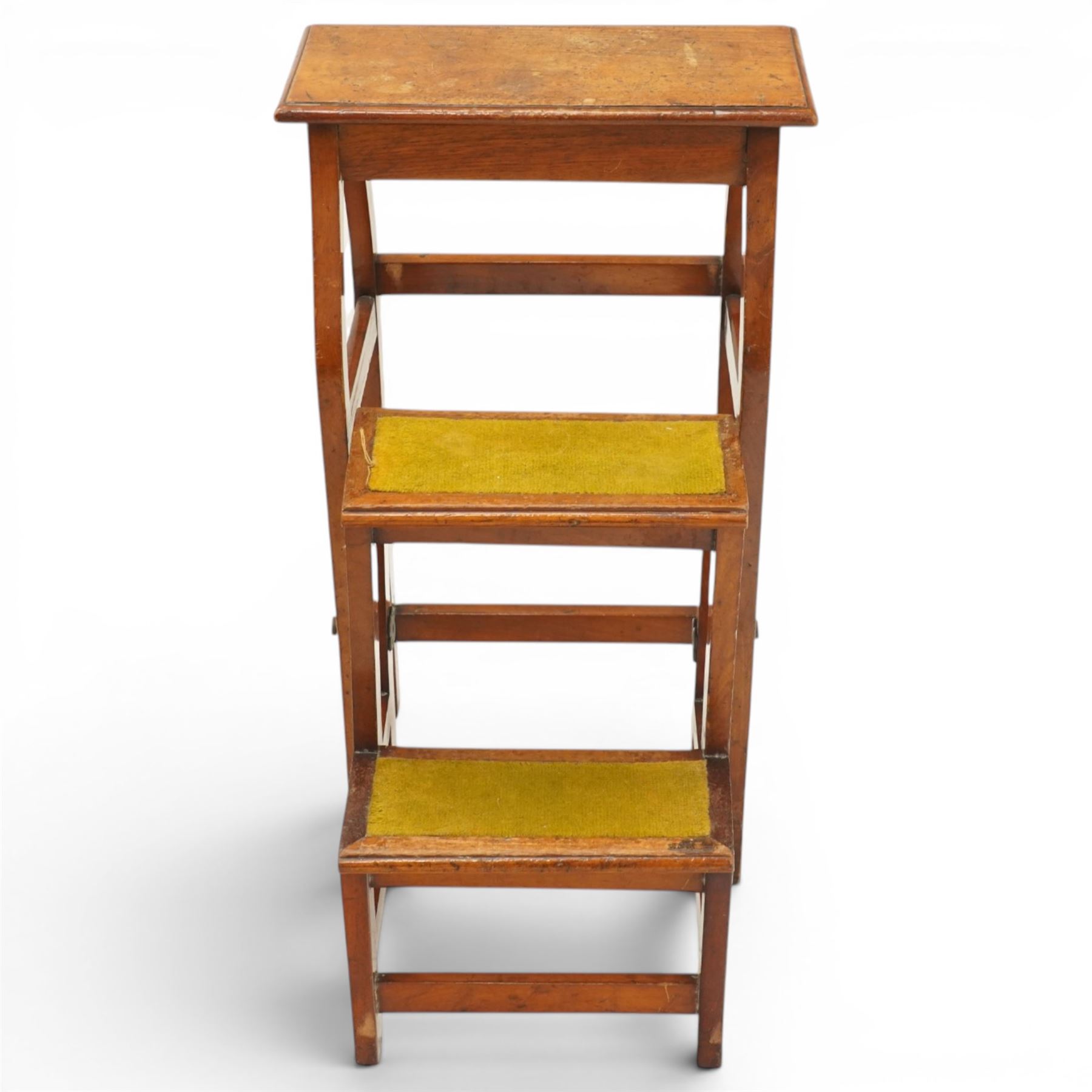 Late 19th century mahogany set of metamorphic library steps, three tread, the hinged lower steps with folding action
Provenance: Kirkham Hall