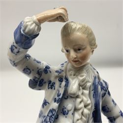 Meissen blue and white figure, modelled as a gentleman holding a hat of flowers, raised upon Greek key design base, with blue crossed swords and impressed C 73 and 149 marks beneath, H18cm