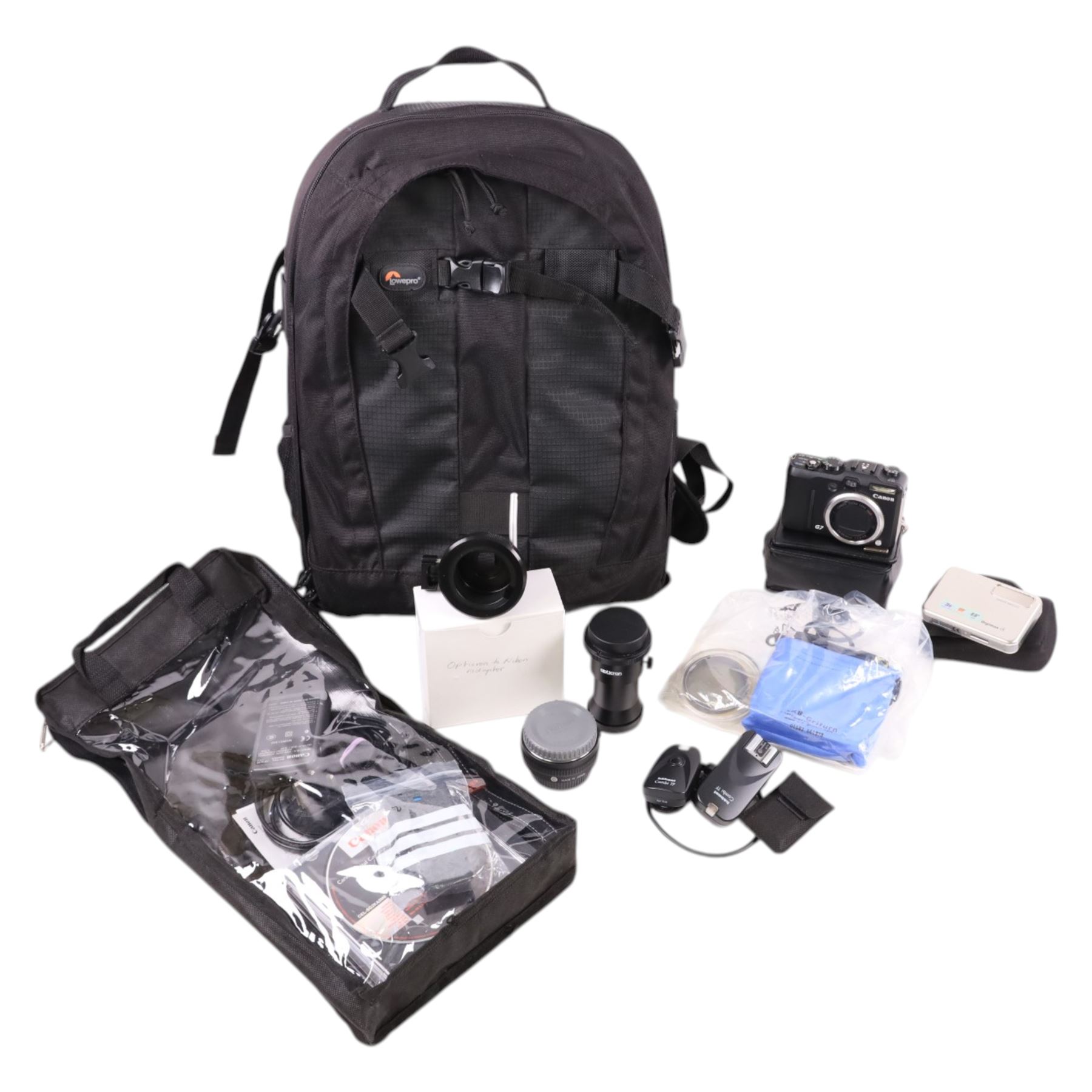 Canon G7 Powershot camera, Samsung Digimax i5 camera and a collection of camera equipment, including Lowepro bag, filters, etc
