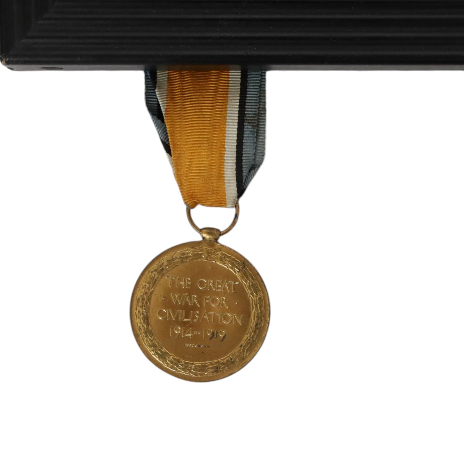 WWI medal trio; Victory medal, 1914/15 star and War medal, framed, together with WWI medal pair; victory and defence medals, awarded to 5832 Pte J Wilson North'O Fus, and WWII Defence Medal, framed