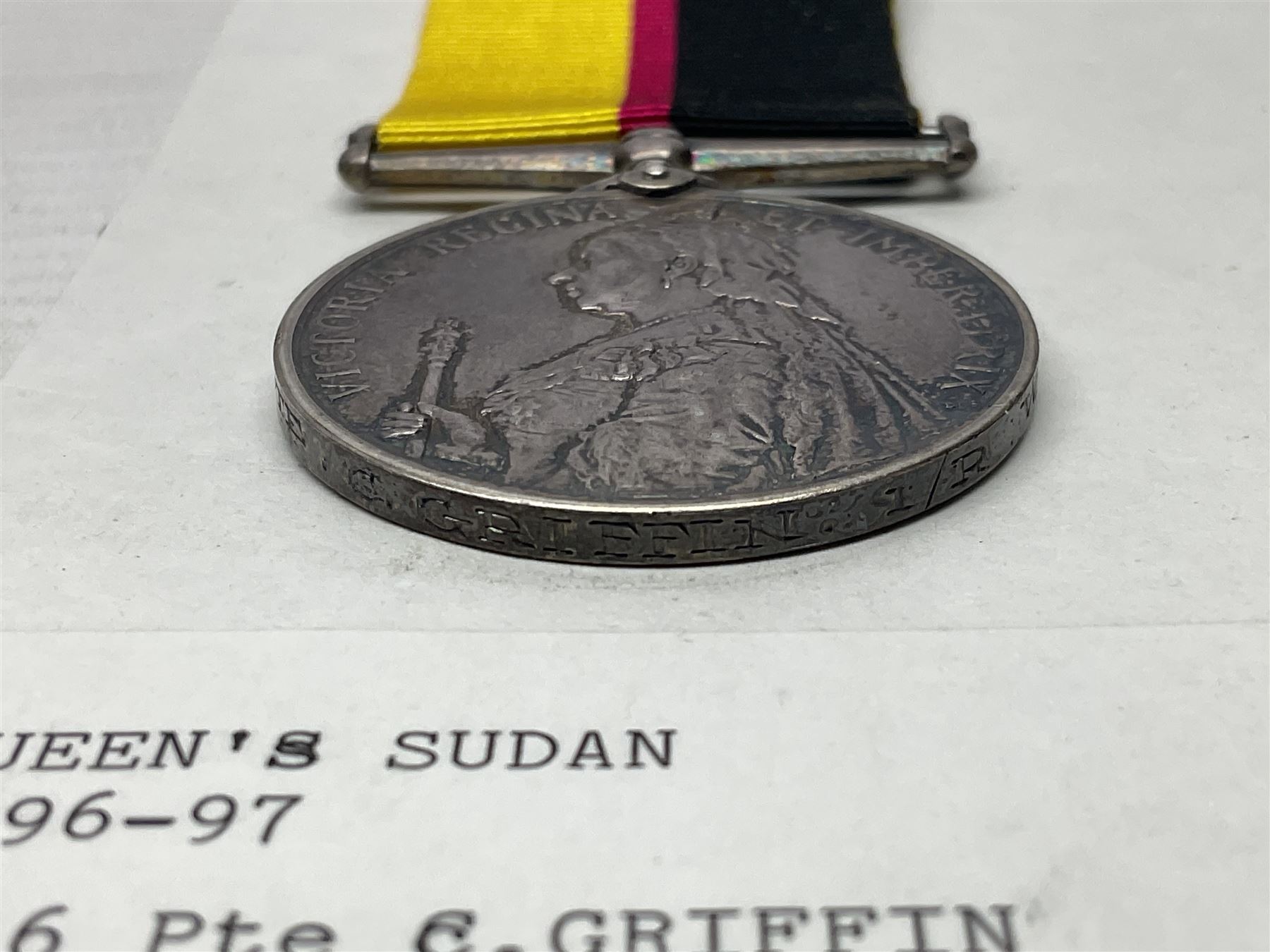 Victoria Queens Sudan Medal 1896-97 awarded to 4616 Pte. C. Griffin 1/R Warwickshire Regiment; with replacement ribbon but original present.
