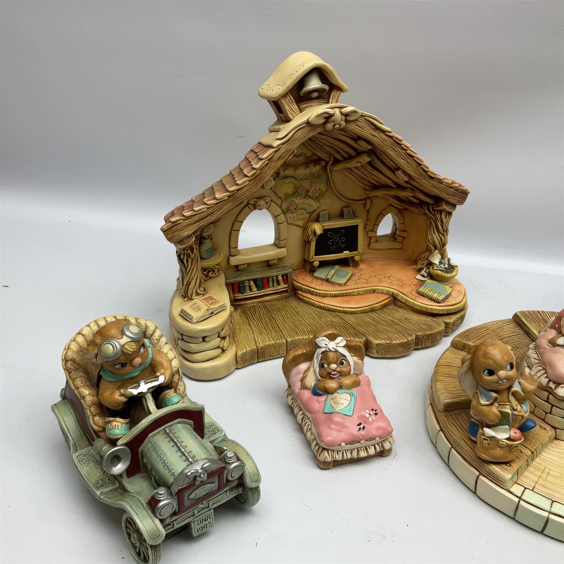 Collection of Pendelfin figures to include Band Stand 'Fruit Shop' and school house displays and six figures