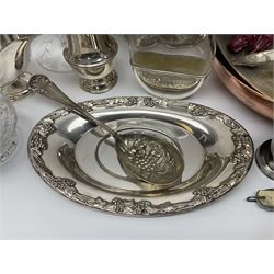 Quantity of silver plate, to include part fluted punch bowl with embossed floral decoration, single glass mounted candle sticks with etched grape vine decoration, sauce boat, salver, glass hip flask etc, together with a pair of copper frying pans 