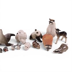 Collection of USSR Lomonosov figures, including racoons, sea lion, horse, lion cubs etc 
