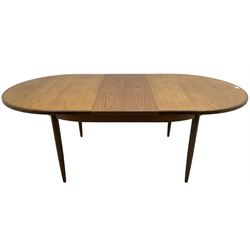 G-Plan - mid-20th century teak 'Fresco' dining table, oval top over concealed integrated double leaf, on cylindrical tapering supports