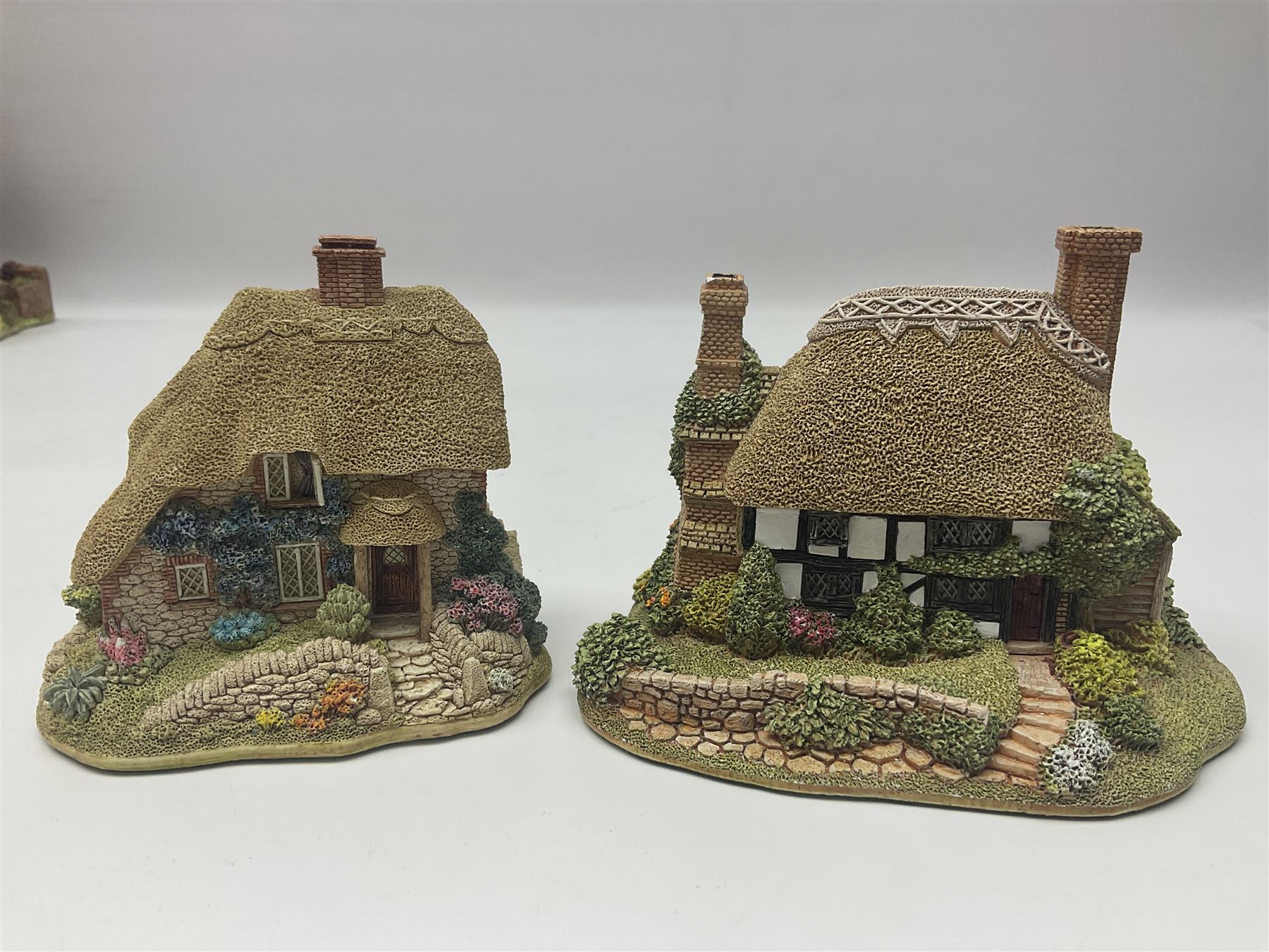 Ten Lilliput Lanes, comprising from Midlands Region Witham Delph, Jun and Disorderly, From South West Region Puffin Row, Moonlight Cove, The Cuddy, and from South West Region, The Rustlings, Saxton Cottage (1988), Marigold Meadow, Calendar Cottage and Little Lupins, all with boxes and deeds 