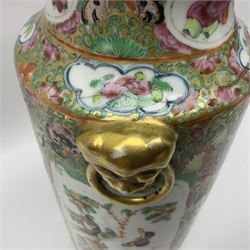 19th century Chinese Canton famille rose vase, converted to a table lamp, of shouldered cylindrical form, with twin gilt lion mask ring handles, the body decorated with four alternating panels of figural scenes and birds and insects, H31cm excluding fitting