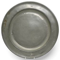 Collection of early 19th century and later British pewter, mostly London label marks, including two large pewter chargers, medicine spoon, flasks, plates and other tableware