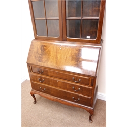  Edwardian inlaid mahogany bureau/bookcase, projecting cornice, two astragal glazed doors enclosing adjustable shelves above fall front with fitted interior, one short and two long drawers, shaped apron with cabriole feet, W98cm, H212cm, D49cm  