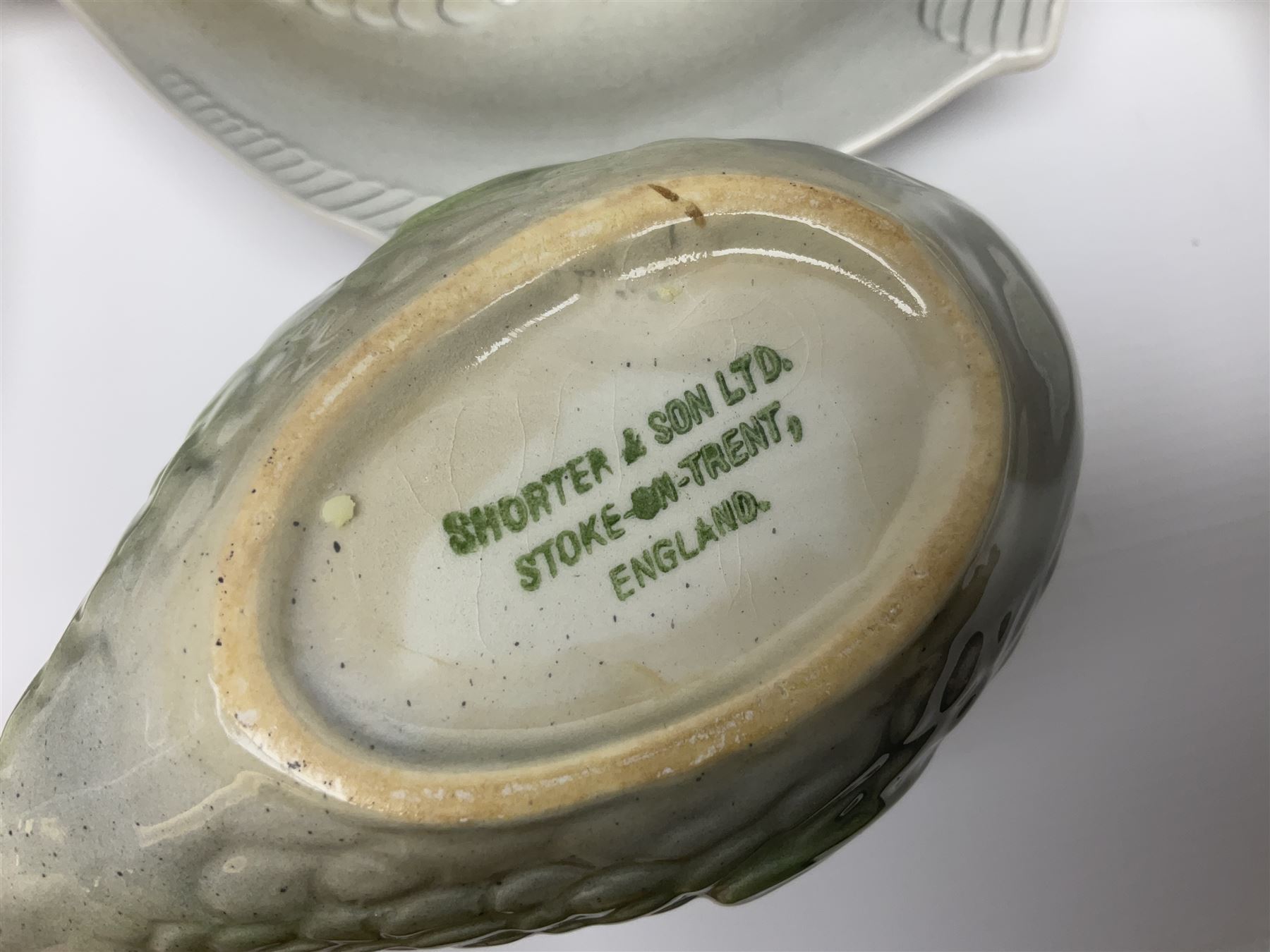 Shorter & Son six fish plates, together with a larger platter and sauce boat and saucer, all with stamped marks beneath