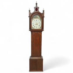 Patrick Forrester of Hull-early 19th century 8-day oak and mahogany longcase, c1830, With a pagoda pediment and three matching ball and spire finials, break arch hood door beneath flanked by reeded pilasters with brass capitals, trunk with canted corners and a full length break arch topped door with crossbanding, on a square plinth with an applied moulding to the base, fully painted dial with matching spandrels and a scene of a huntsman to the arch, with Roman numerals, fifteen minute Arabic's, stamped brass hands, seconds dial and date aperture, dial pinned via a falseplate to a rack striking movement, striking the hours on a bell. With key, weights and pendulum.   A good example of this refined design of case popular in the East Riding of Yorkshire and London, the hood is of particularly good proportions.
Patrick Forrester is listed as working in Hull 1813-1840, also as a Jeweller and Goldsmith.         