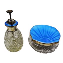 Art Deco thirteen piece silver mounted blue guilloche enamel dressing table set, comprising two hair brushes, two clothes brushes, hand mirror, two cut glass jars, buffer and a cut glass scent bottle, hallmarked J W Tiptaft & Son Ltd, Birmingham 1930 and 1932, and a silver handled manicure set, hallmarked Daniel Manufacturing Company, Birmingham 1930, with a pair of base metal scissors, each contained within three original fitted cases with black and cream silk and velvet lined interiors, one with removable mirror