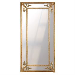 Early 20th century giltwood wall mirror, tall rectangular form, moulded outer frame with f...