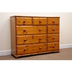  Solid pine chest, moulded top, nine drawers, bun feet, W133cm, H102cm, D43cm  