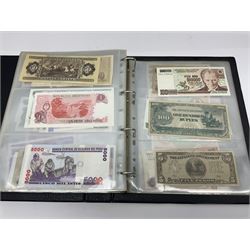 World and Great British banknotes to include Brazil, Canada, France, Germany, Ghana, Indonesia, Iraq, Hong Kong, Hungary, Japan, Vietnam, Zimbabwe, a collection of Chinese ‘Hell Money’, and quantity of ‘De La Rue Systems’ test notes, housed in ring binder and loose