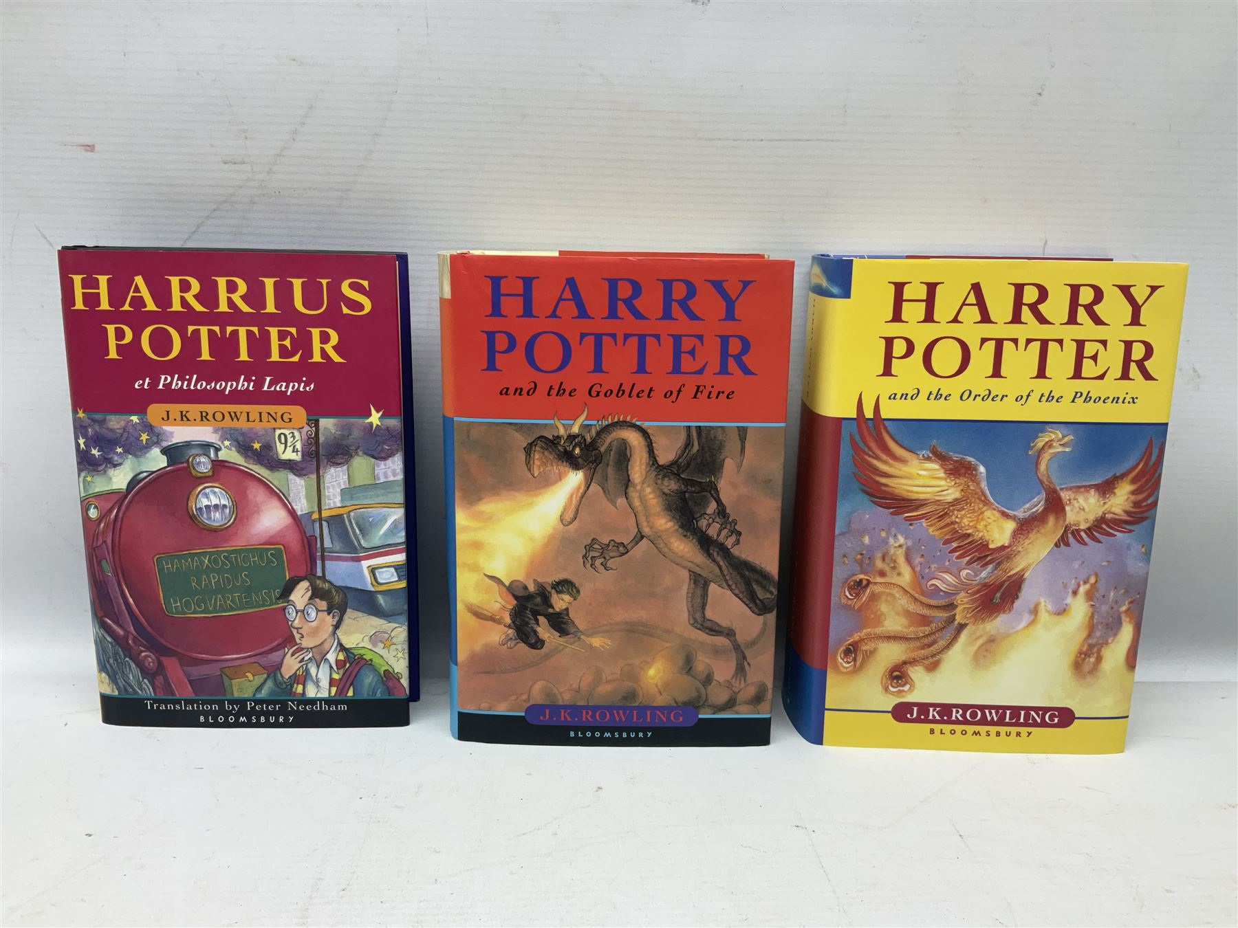 Collection of first edition books, to include J.K. Rowling; Harry Potter and the Goblet of Fire, Harry Potter and the Order of the Phoenix, Harry Potter and the Half Blood Prince, Harry Potter and the Deathly Hallows, Harrius Potter et Philosophi Lapis, G.P.Taylor; Shadowmancer, signed by author, Hans Hass; Men and Sharks, etc (15)    