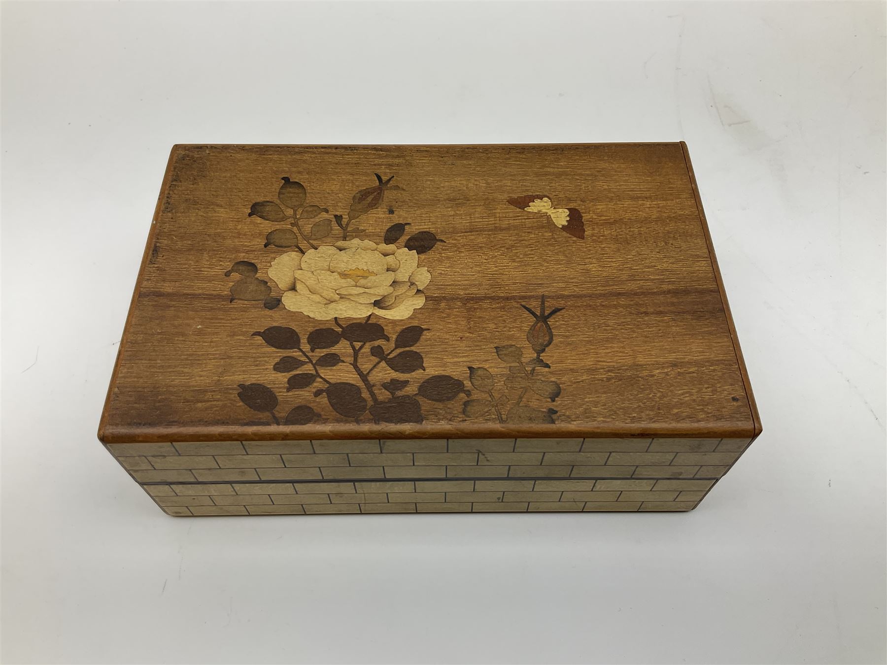 Japanese parquetry puzzle box L12cm; another Japanese puzzle box with marquetry top of Mount Fuji; eleven graduated Chinese figures including immortals; and Chinese figure of a lady standing on a hardwood base next to a horn table (14)