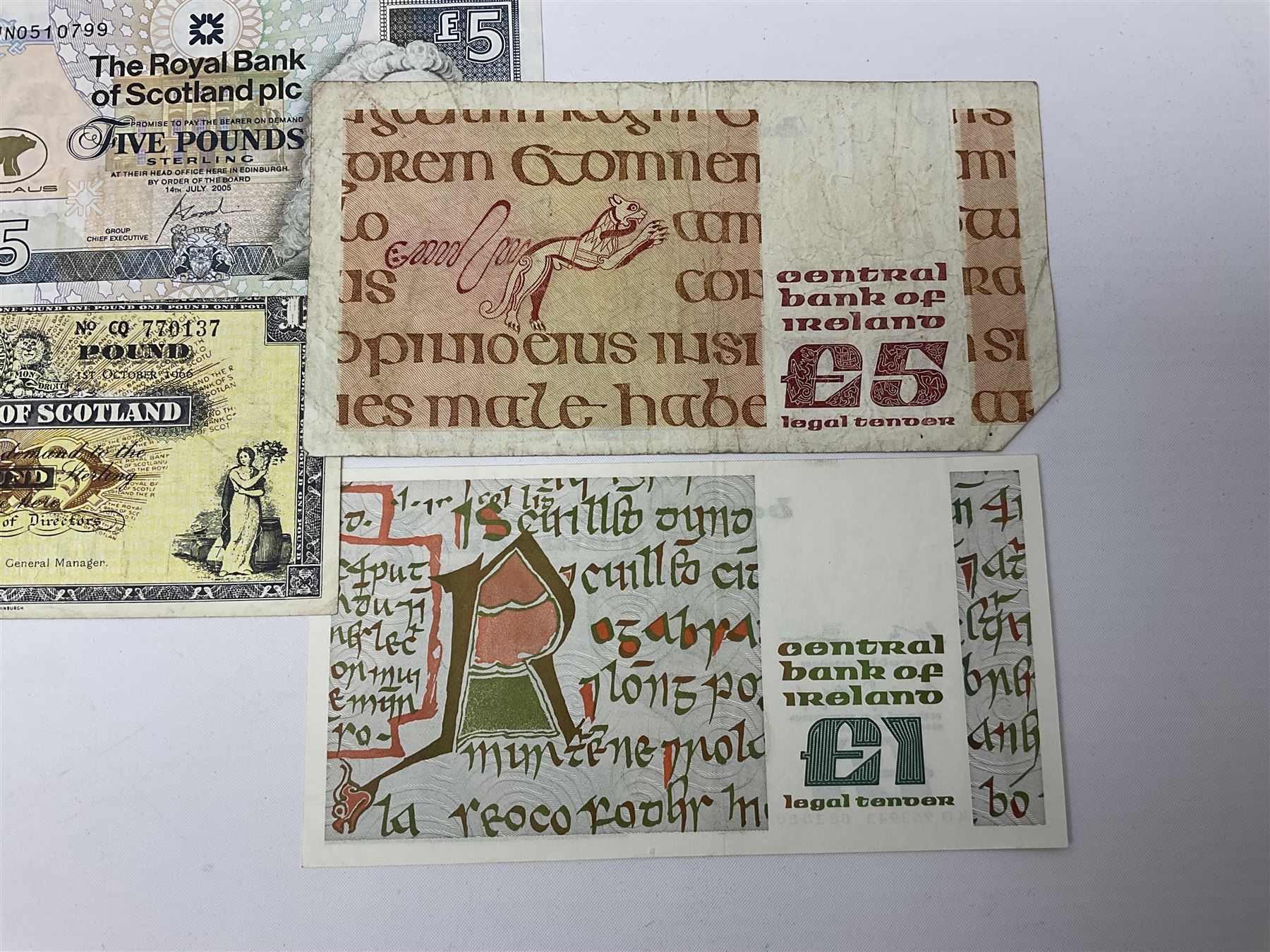 Irish and Scottish banknotes to include Bank of Ireland 5 January 1939 ‘B15’ one pound, two Bank of Scotland 1964 ‘AD07’ and ‘AF05’ one pound notes, one 1966 ‘CQ77’ one pound, and further notes from Clydesdale Bank, National Commercial Bank of Scotland Ltd. etc, housed in plastic sleeves