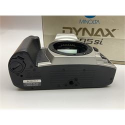 Four Minolta camera bodies, to include Dynax 500si, serial no. 94812651 with 'Signa Zoom 1;3.5-4.5 f=28-70mm' lens, Maxxum 300si, serial no. 97821665, with 'Tamron AF 80-210mm' lens and Dynax 300si, serial no 01603265'  with Minolta AF Power Zoom 35-80mm 1;4' lens, etc, together with Pantax MV1 camera bodies and other camera equipment 