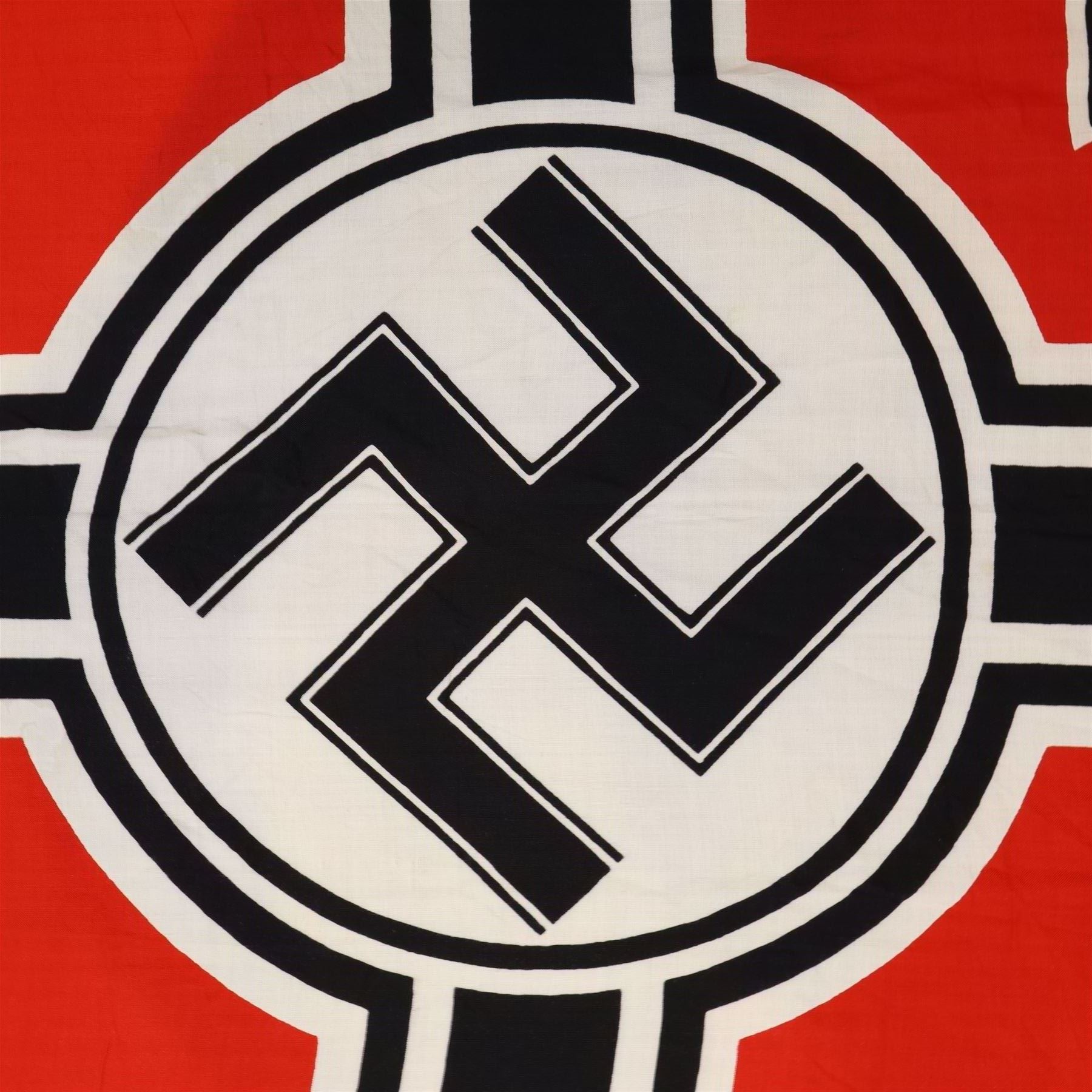 WWII German Third Reich Nazi Kriegsmarine/Navy Reichskriegsflagge, with iron cross to corner and swastika to centre, stamped to the hoist with eagle over 'M', and 'Reichskriegs-Flg. 100cm x 170cm