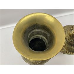 Pair of Chinese brass vases, of ovoid form with elongated neck and fluted rim, decorated in high relief with a dragon chasing a flaming pearl around the neck, the body with dragons, birds and buildings, with character marks beneath, H25cm