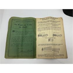 George Formby banjolele with metal plaque to headstock L55cm; in carrying case with instruction booklet.