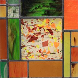 Valerie Green - 21st century stained glass and leaded panel, in green, orange and yellow colourways   