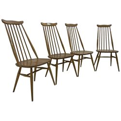 Ercol - set of four mid-20th century elm and beech Windsor 'Goldsmith' dining chairs, yoke cresting rail over high spindle back