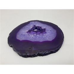 Pair of purple agate slices, polished with rough edges, raised upon gilt metal stands