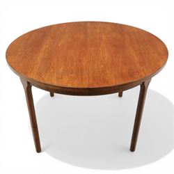 A H McIntosh & Co of Kirkcaldy - teak circular top with moulded edge enclosing butterfly leaf extension, raised on four tapering supports, extending action revealing central leaf, 167cm fully extended