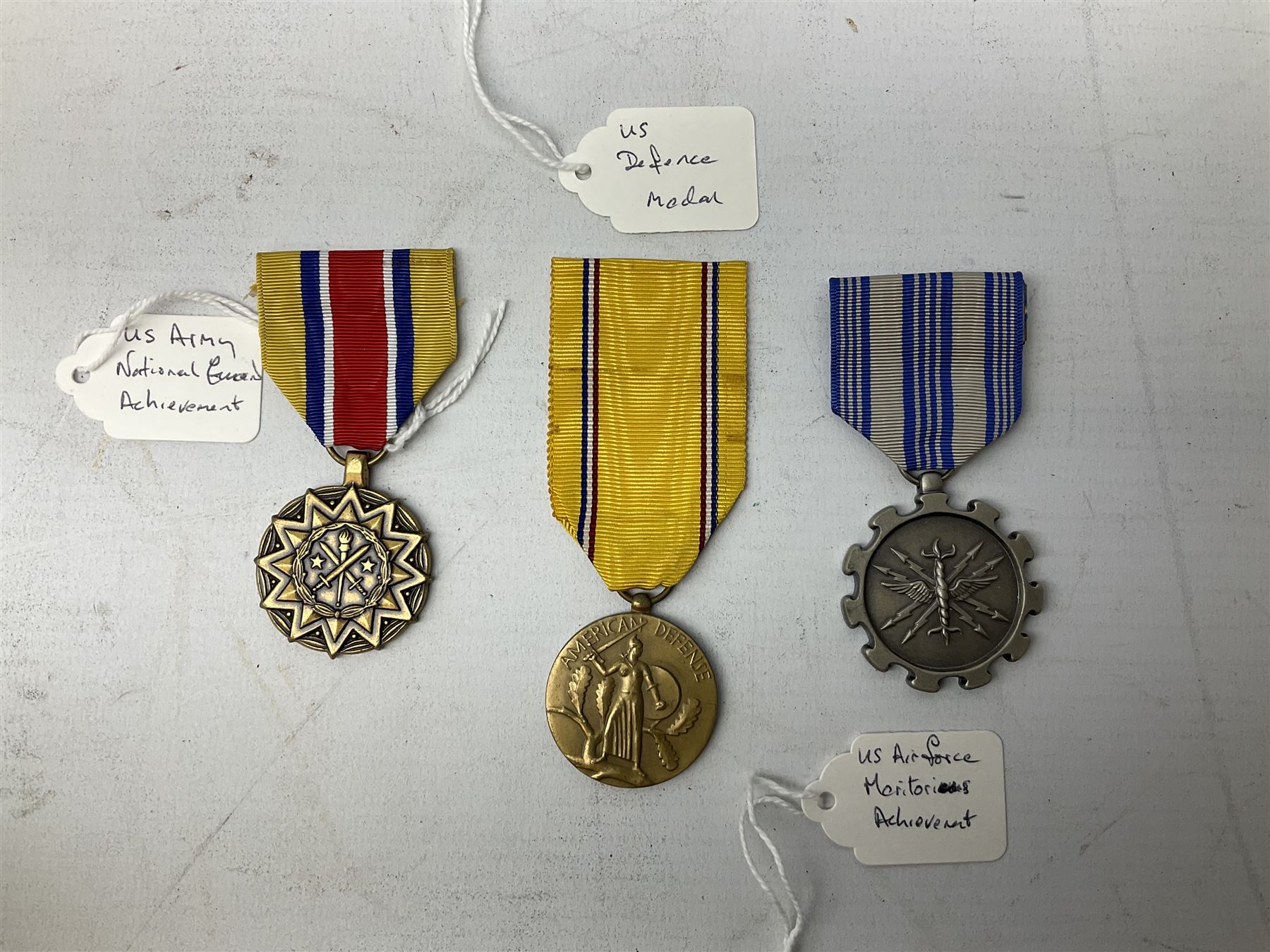 Nine American medals including WW2 Navy and Army Occupation medals, 1939-41 Defence Medal, boxed National Defence Medal and bar, South West Asia Service with bar, Air Force, National Guard and Military achievement medals etc (9)